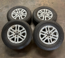 Load image into Gallery viewer, OEM '22-'26 Toyota Tundra 18" Silver Wheels 265/70R18 Bridgestone Dueler H/T LT
