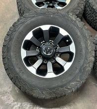 Load image into Gallery viewer, Set of 4 Used OEM '05-'26 RAM 2500 Power Wagon Wheels on 285/70R17 BFGoodrich AT

