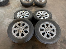 Load image into Gallery viewer, OEM '05-'26 RAM 2500 20" Polished Used Wheels on 285/60R20 Michelin Defender LT
