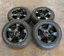 Load image into Gallery viewer, Set of Used &#39;19-&#39;25 RAM 1500 Black OEM Wheels on 275/55R20 Bridgestone Tires LT
