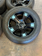 Load image into Gallery viewer, Set of Used &#39;19-&#39;25 RAM 1500 Black OEM Wheels on 275/55R20 Bridgestone Tires LT
