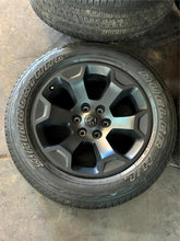 Load image into Gallery viewer, Set of 4 Used OEM &#39;19-&#39;25 RAM 1500 Big Horn Black Wheels on 275/55R20 Tires LT
