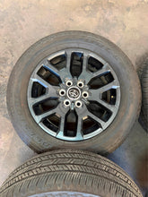Load image into Gallery viewer, Set of 4 Used '22-'26 Toyota Tundra 20" Dark Grey Rims 265/60R20 Bridgestone LT
