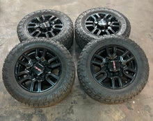 Load image into Gallery viewer, Set of Four Used &#39;11-&#39;25 GMC Sierra 2500 3500 Black Wheels 275/65R20 Toyo AT3 LT
