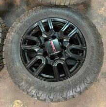 Load image into Gallery viewer, Set of Four Used &#39;11-&#39;25 GMC Sierra 2500 3500 Black Wheels 275/65R20 Toyo AT3 LT
