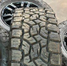 Load image into Gallery viewer, Set of Four Used &#39;11-&#39;25 GMC Sierra 2500 3500 Black Wheels 275/65R20 Toyo AT3 LT
