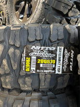 Load image into Gallery viewer, Set of 4 OEM 17" '05-'26 RAM 2500 3500 Power Wagon Wheels 35/12.50R17 Mud Tires
