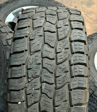 Load image into Gallery viewer, Set of 4 Used OEM 18&quot; &#39;19-&#39;25 Dodge RAM 1500 Wheels on 275/70R18 Cooper Tires LT
