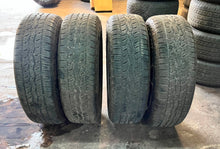 Load image into Gallery viewer, Set of Used &#39;22-&#39;25 Toyota Tundra TRD Black Wheels on 265/60R20 Falken Tires LT
