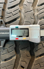 Load image into Gallery viewer, Set of Used &#39;22-&#39;25 Toyota Tundra TRD Black Wheels on 265/60R20 Falken Tires LT
