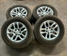 Load image into Gallery viewer, Set of Four Used OEM 18&quot; Chevy Silverado 1500 Wheels on 265/65R18 Goodyear AT LT
