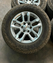 Load image into Gallery viewer, Set of Four Used OEM 18&quot; Chevy Silverado 1500 Wheels on 265/65R18 Goodyear AT LT
