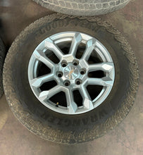 Load image into Gallery viewer, Set of Four Used OEM 18&quot; Chevy Silverado 1500 Wheels on 265/65R18 Goodyear AT LT
