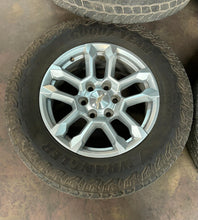 Load image into Gallery viewer, Set of Four Used OEM 18&quot; Chevy Silverado 1500 Wheels on 265/65R18 Goodyear AT LT
