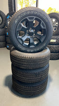 Load image into Gallery viewer, Set of Four OEM Black &#39;19-&#39;25 RAM 1500 Wheels 275/55R20 Bridgestone Alenza Tires
