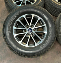 Load image into Gallery viewer, Set of 4 Used 18&quot; &#39;05-&#39;24 Ford F-150 Wheels on 275/65R18 Michelin Primacy XC LT
