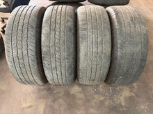 Load image into Gallery viewer, Set of 4 Used OEM '05-'26 Ford F-150 Black 10348 Wheels 275/60R20 Hankook AT2 LT
