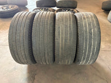 Load image into Gallery viewer, Set of 4 Used 22" Black '19-'26 RAM 1500 2725 Wheels 285/45R22 Pirelli Tires LT
