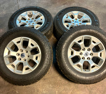 Load image into Gallery viewer, Set of 4 Used &#39;05-&#39;25 Ford F150 18&quot; Silver Painted Wheels on 275/65R18 Tires LT
