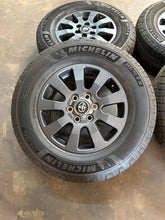 Load image into Gallery viewer, Set of Lightly Used OEM '24-'26 Toyota Land Cruiser Wheels 265/70R18 Michelin LT
