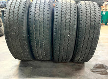 Load image into Gallery viewer, Set of 4 Used OEM 20&quot; &#39;05-&#39;25 Ford F250 F350 Black Rims 275/65R20 Bridgestone LT
