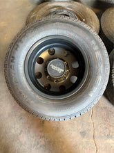 Load image into Gallery viewer, Set of 6 Used American Racing Baja 17&quot; Matte Black Rims 235/80R17 Nexen Tires LT
