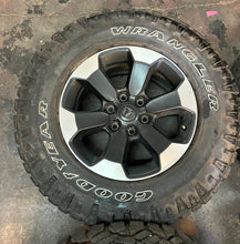 Load image into Gallery viewer, Set of Four Used 18&quot; &#39;19-&#39;24 Dodge RAM 1500 Rims on 275/70R18 Goodyear Tires LT
