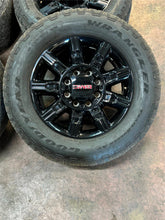 Load image into Gallery viewer, Set of 4 Used OEM &#39;11-&#39;25 GMC Sierra 2500 3500 Black Wheels 275/65R20 Tires LT
