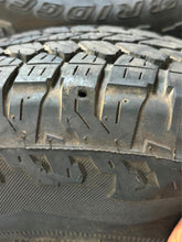 Load image into Gallery viewer, Set of Used &#39;00-&#39;25 Chevy Silverado 1500 Black Rims 275/60R20 Bridgestone AT LT
