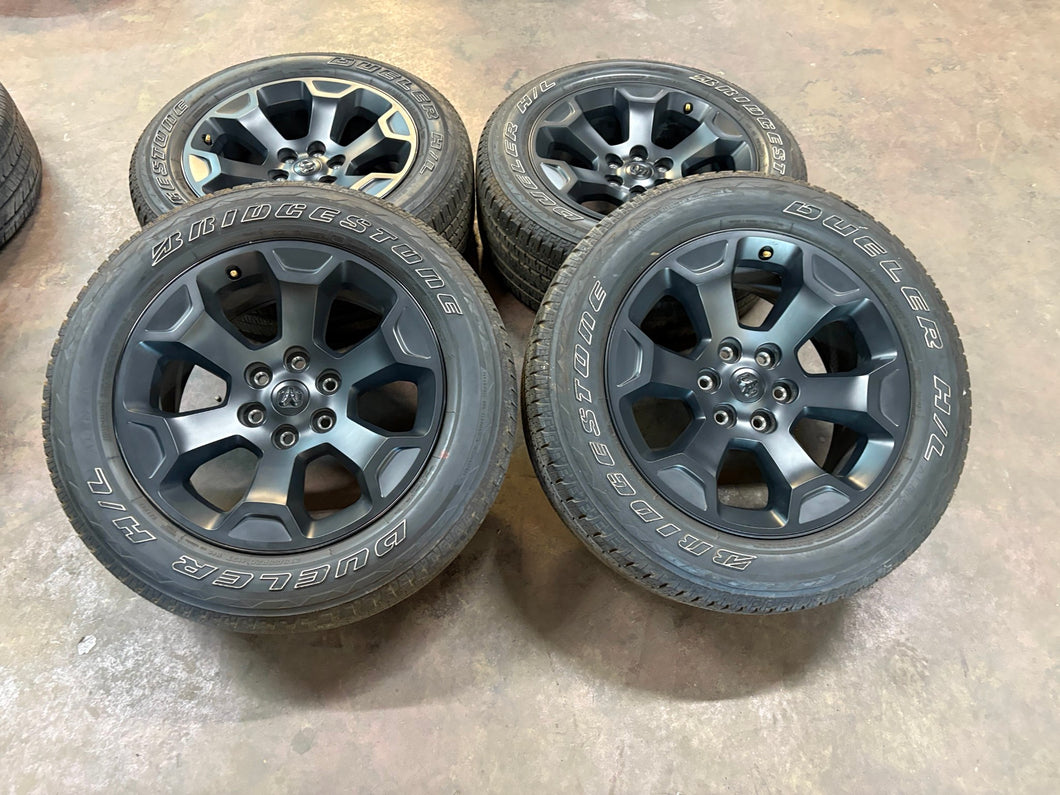 Set of 4 Used OEM Black '19-'25 RAM 1500 Rims 275/55R20 Bridgestone RWL Tires LT