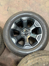 Load image into Gallery viewer, Set of 4 Used OEM Black &#39;19-&#39;25 RAM 1500 Rims 275/55R20 Bridgestone RWL Tires LT

