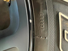 Load image into Gallery viewer, Set of 4 Used OEM Black &#39;19-&#39;25 RAM 1500 Rims 275/55R20 Bridgestone RWL Tires LT
