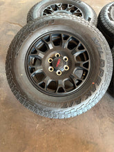 Load image into Gallery viewer, Set of Four OEM &#39;24-&#39;25 Toyota Tacoma TRD Wheels 265/70R18 Falken Wildpeak AT LT
