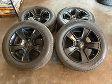 Load image into Gallery viewer, Set of 4 Used Black &#39;19-&#39;25 Dodge RAM 1500 OEM Wheels 275/55R20 Ironman Tires LT
