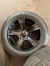 Load image into Gallery viewer, Set of 4 Used Black &#39;19-&#39;25 Dodge RAM 1500 OEM Wheels 275/55R20 Ironman Tires LT
