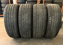 Load image into Gallery viewer, Set of 4 Used Black &#39;19-&#39;25 Dodge RAM 1500 OEM Wheels 275/55R20 Ironman Tires LT
