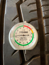 Load image into Gallery viewer, Set of 4 Used Black &#39;19-&#39;25 Dodge RAM 1500 OEM Wheels 275/55R20 Ironman Tires LT
