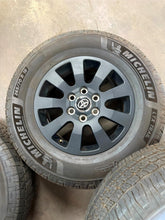 Load image into Gallery viewer, Set of Used &#39;24-&#39;25 Toyota Land Cruiser Dark Charcoal Rims 265/70R18 Michelin LT
