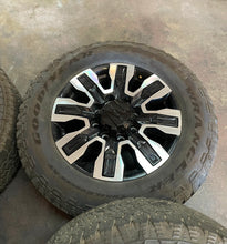 Load image into Gallery viewer, Four Used 20&quot; &#39;11-&#39;24 GMC Sierra 3500 HD Denali Wheels on 275/65R20 Goodyears LT
