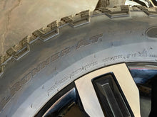 Load image into Gallery viewer, Four Used 20&quot; &#39;11-&#39;24 GMC Sierra 3500 HD Denali Wheels on 275/65R20 Goodyears LT
