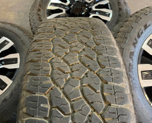 Load image into Gallery viewer, Four Used 20&quot; &#39;11-&#39;24 GMC Sierra 3500 HD Denali Wheels on 275/65R20 Goodyears LT
