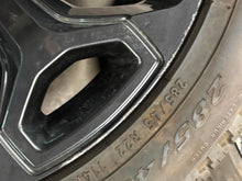 Load image into Gallery viewer, Set of Four Used Matte Black 22&quot; &#39;19-&#39;25 RAM 1500 Rims 285/45R22 Pirelli AS LT
