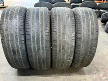 Load image into Gallery viewer, Set of Four Used Matte Black 22&quot; &#39;19-&#39;25 RAM 1500 Rims 285/45R22 Pirelli AS LT
