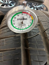 Load image into Gallery viewer, Set of Four Used Matte Black 22&quot; &#39;19-&#39;25 RAM 1500 Rims 285/45R22 Pirelli AS LT
