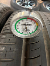 Load image into Gallery viewer, Set of Four Used Matte Black 22&quot; &#39;19-&#39;25 RAM 1500 Rims 285/45R22 Pirelli AS LT
