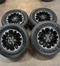 Load image into Gallery viewer, Set of Lightly Used OE &#39;22-&#39;25 Toyota Tundra 18&quot; Wheels on 265/70R18 Michelin LT
