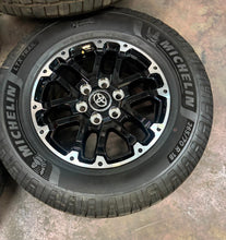 Load image into Gallery viewer, Set of Lightly Used OE &#39;22-&#39;25 Toyota Tundra 18&quot; Wheels on 265/70R18 Michelin LT
