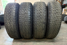 Load image into Gallery viewer, Set of 4 OEM Takeoff &#39;24-&#39;25 Toyota Tacoma TRD Wheels 265/70R17 Trail Terrain LT
