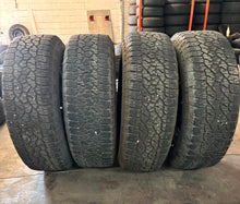 Load image into Gallery viewer, Set of 4 Used OE &#39;11-&#39;25 GMC 2500 Denali Ultimate Rims 275/65R20 Goodyear LRE LT
