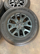 Load image into Gallery viewer, Set of OEM 17&quot; &#39;24-&#39;25 Toyota Tacoma Dark Charcoal Wheels 245/70R17 Yokohama LT
